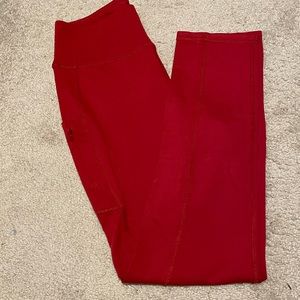 Jaanuu high waisted yoga pants in garnet / red